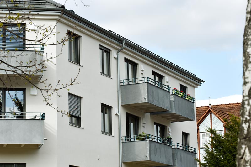 Mehrfamilienhaus als Holzbau in Körle mit Balkonen